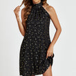 Load image into Gallery viewer, Gold Foil Star Halter Neck Tie Back Mini Dress In Black
