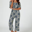 Load image into Gallery viewer, Off The Shoulder Print Frill Jumpsuit In Navy