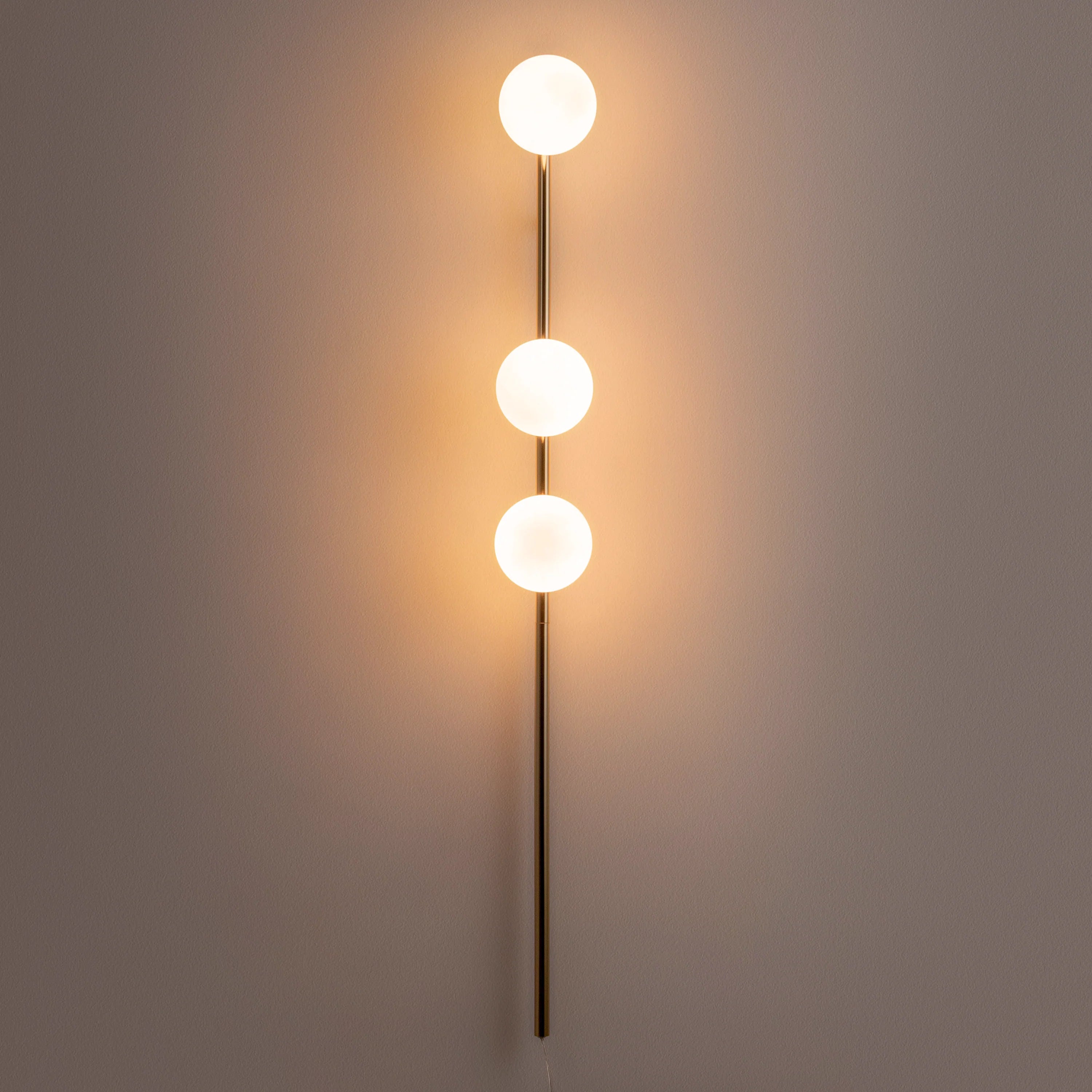Brass bar plug-in wall light