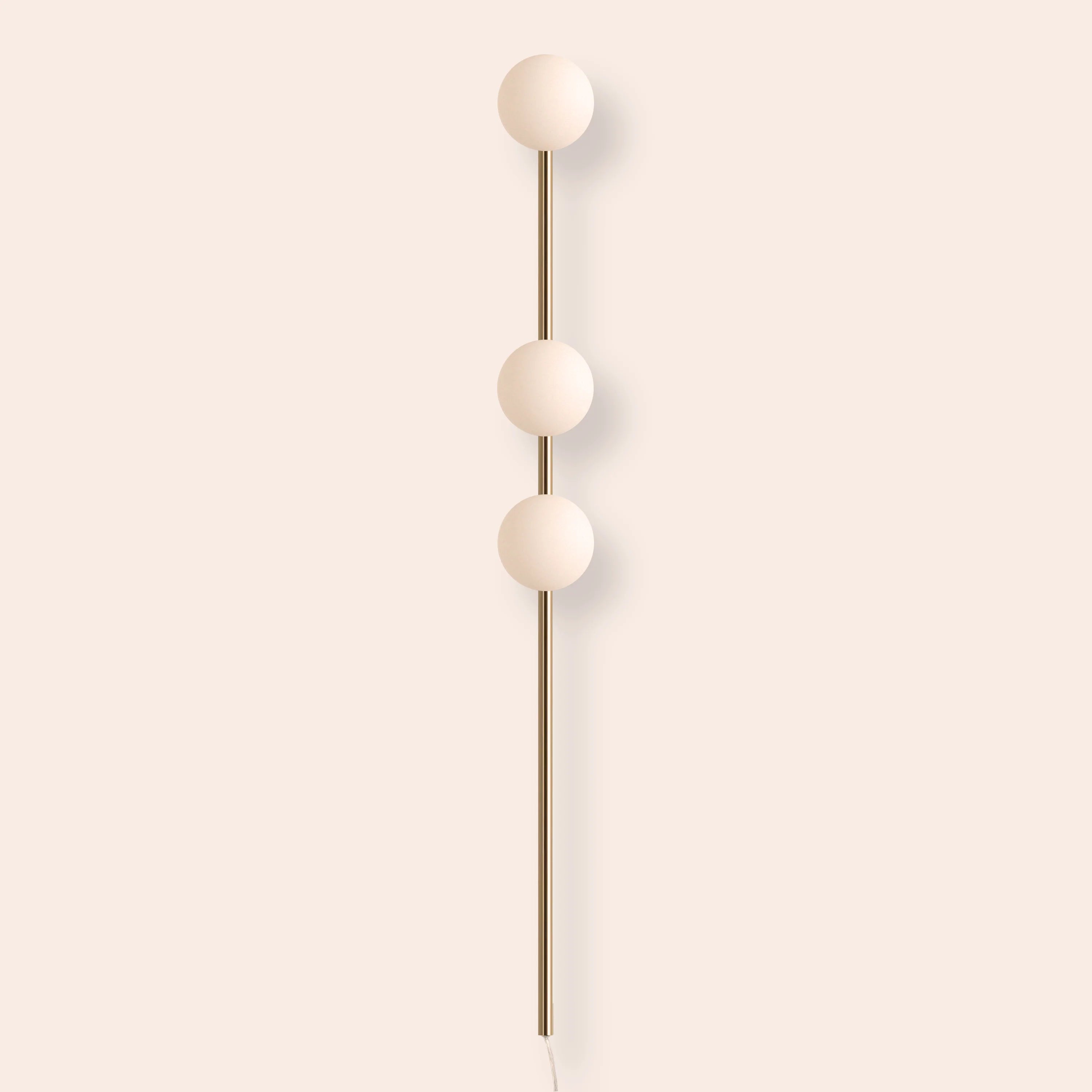Brass bar plug-in wall light