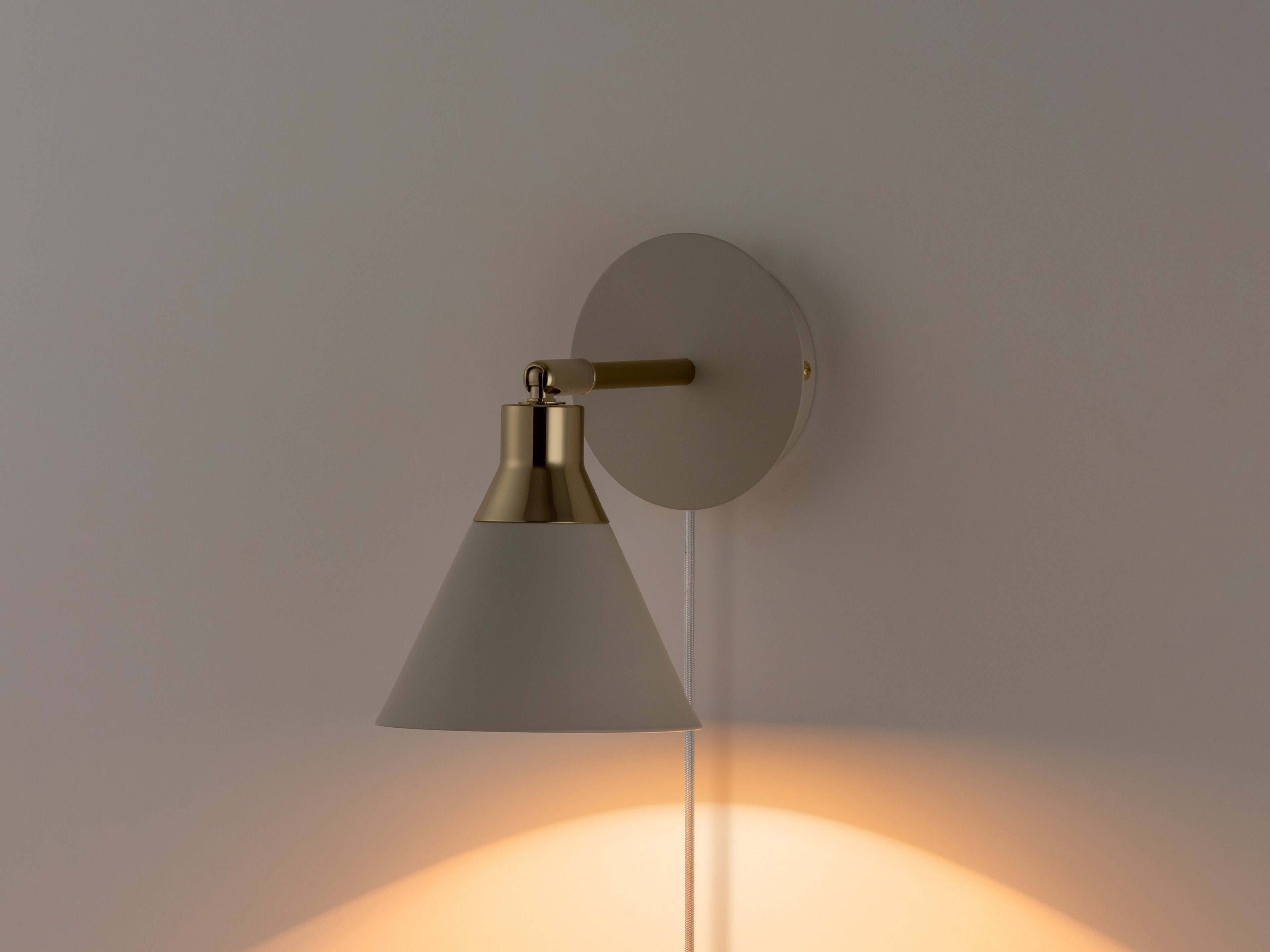 Sand grey cone plug-in wall light
