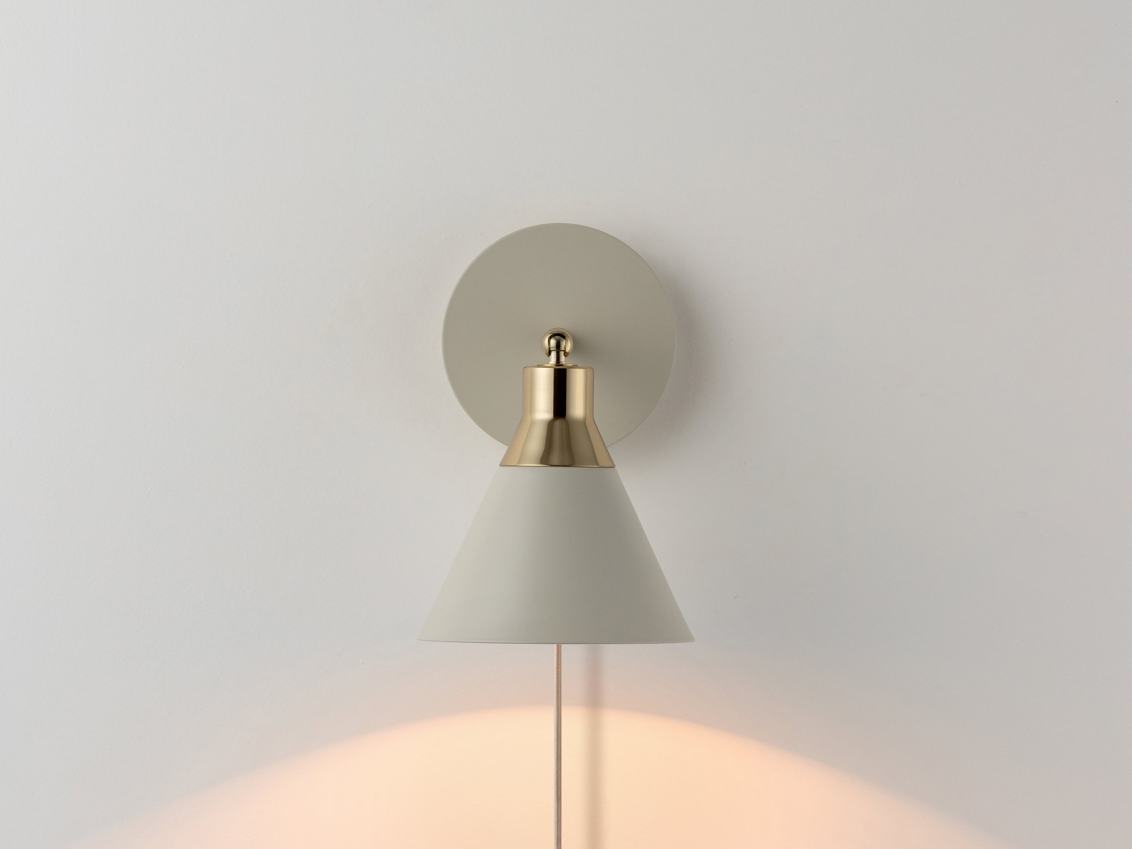 Sand grey cone plug-in wall light