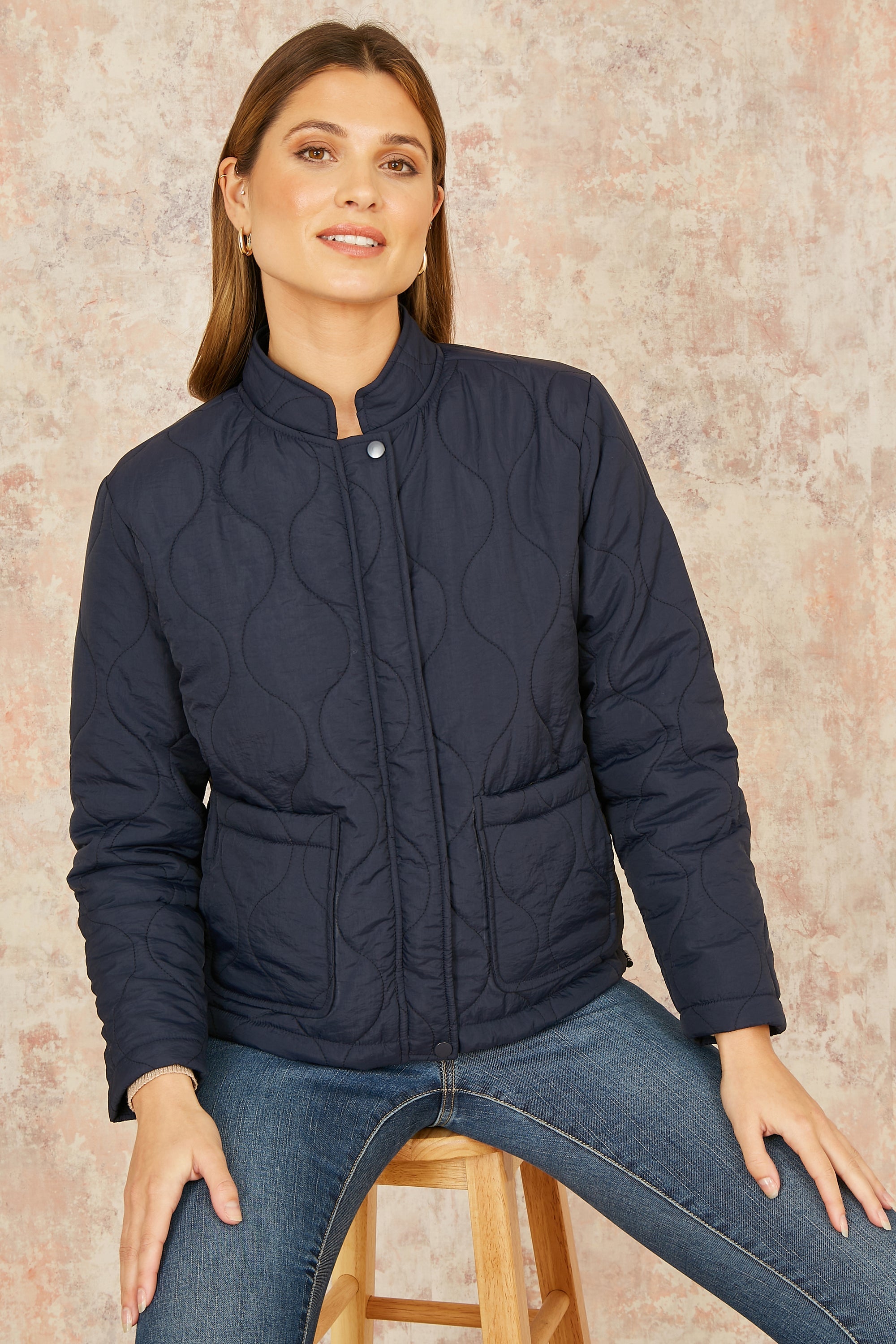 Navy Short Quilted Jacket .