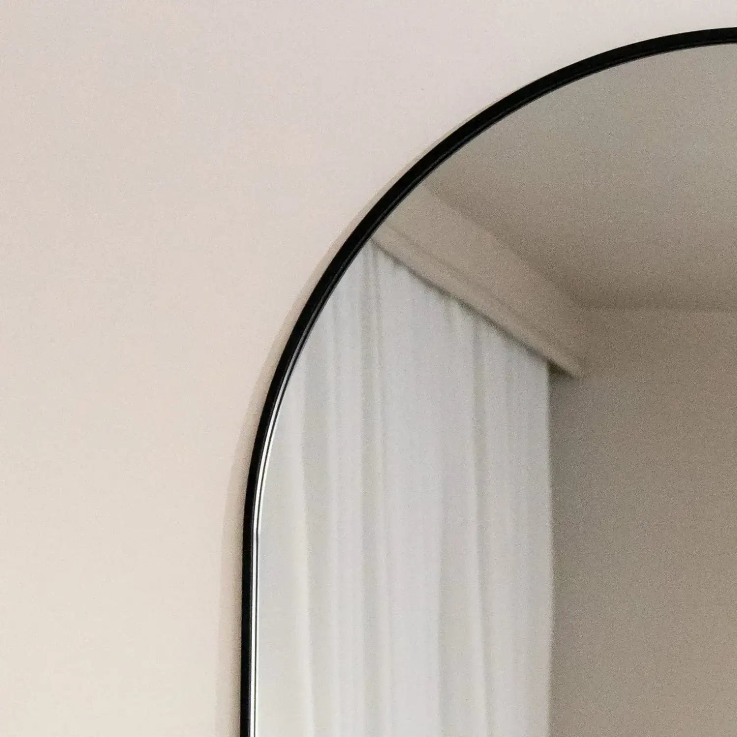 Black Oval Mirror