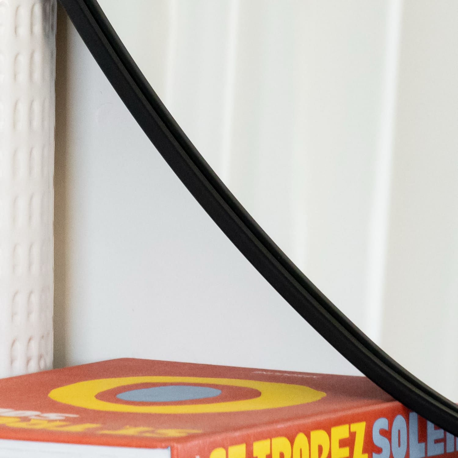 Black Metal Irregular Pebble Mirror